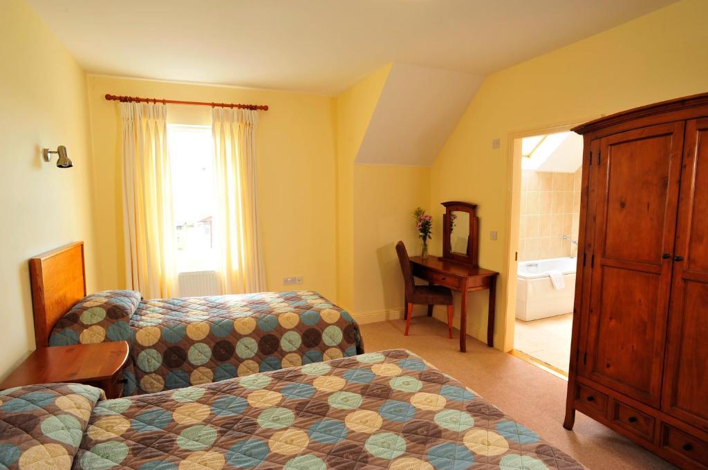 Dundrum House Hotel, Golf & Leisure Resort Bilik gambar